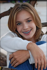 stock photo of a teen girl with braces