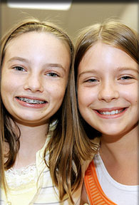 stock photo of 2 girls with braces